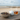 AI Gegenereerd beeld met Zeeuwse thee in een schaal, met de zee en het strand op de achtergrond.